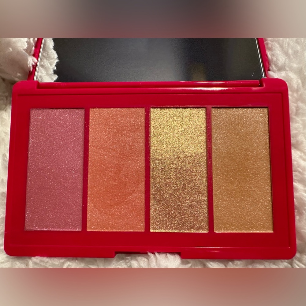 Lancome Paris - Starlight Face Palette. Swatched with a new brush.